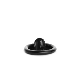 Photo of Unpacked black condom isolated on white. Safe sex