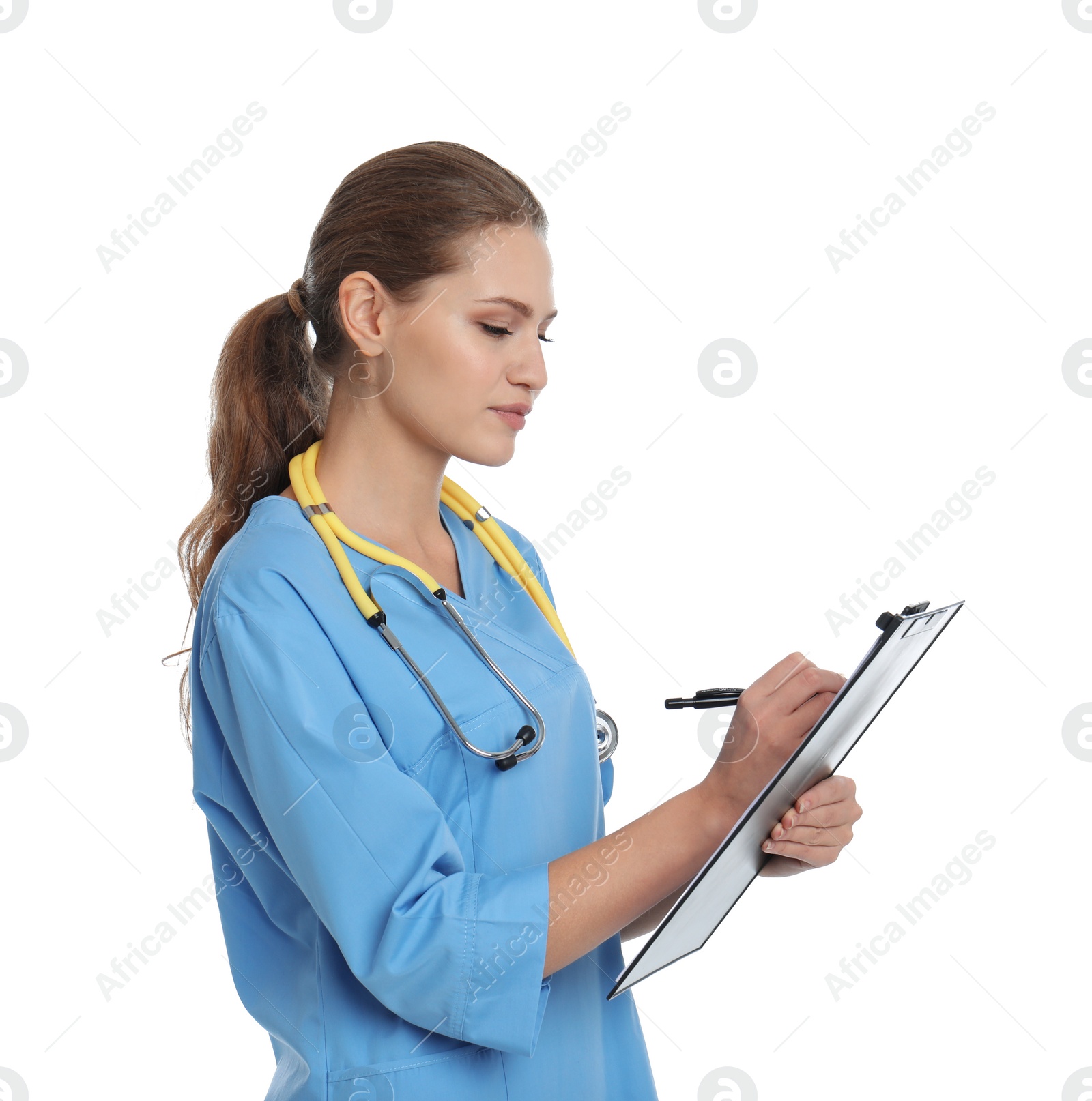 Photo of Portrait of young medical assistant with stethoscope and clipboard on white background