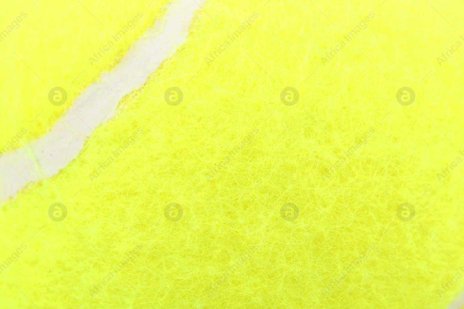 Photo of One tennis ball as background, closeup view