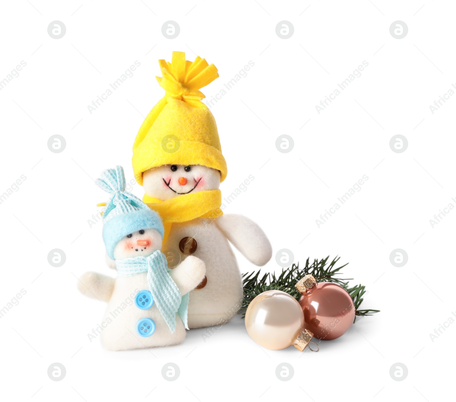 Photo of Cute snowmen and Christmas decoration on white background