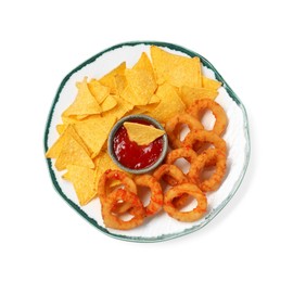 Photo of Tasty tortilla chips and fried onion rings with ketchup isolated on white, top view