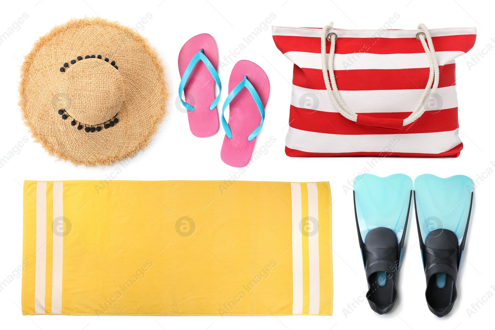 Image of Set with towel and other beach accessories on white background