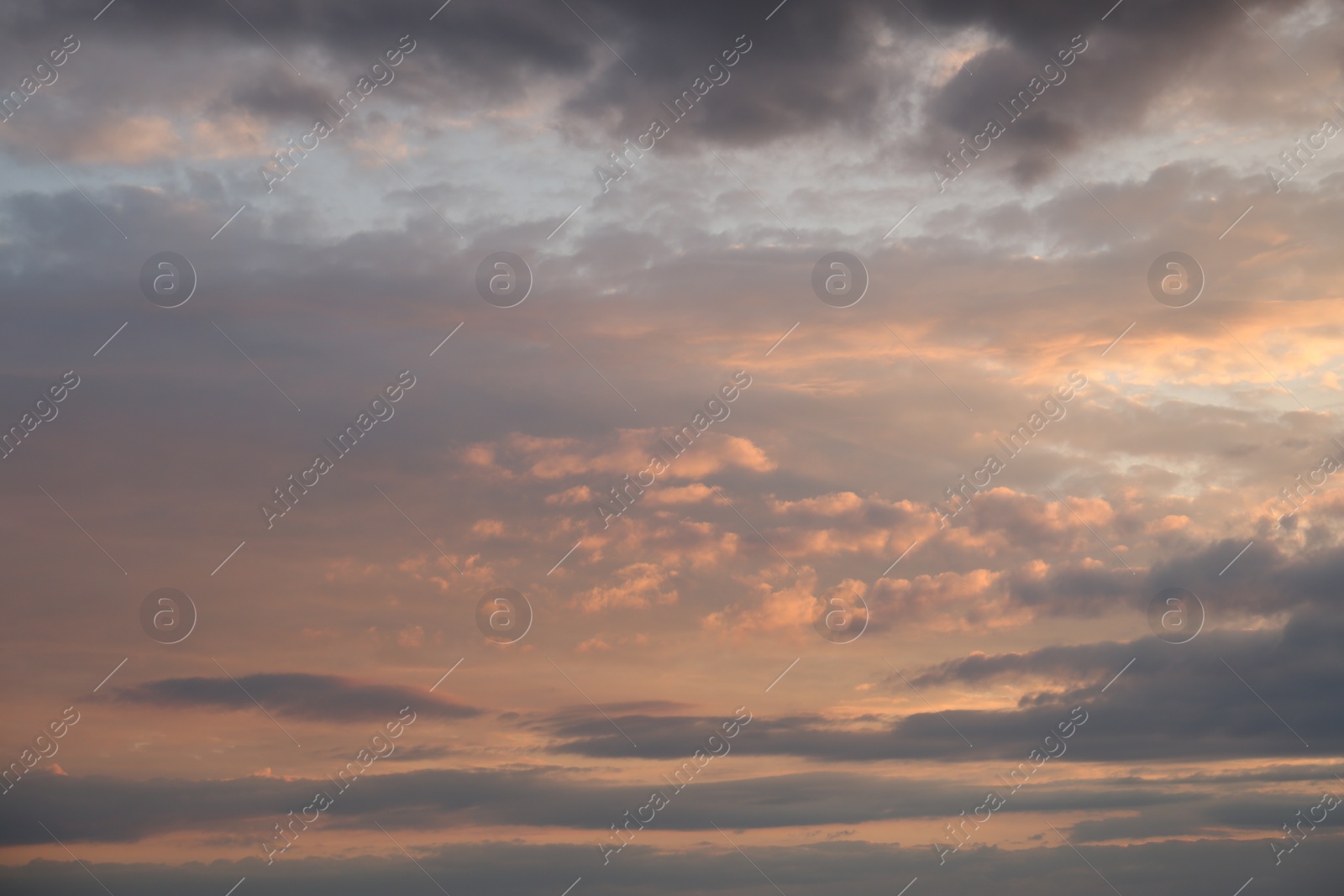 Photo of Picturesque view of sunset sky with beautiful clouds