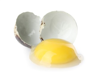 Photo of One cracked quail egg isolated on white
