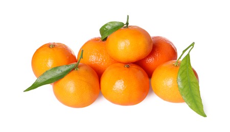 Fresh ripe tangerines and green leaves isolated on white