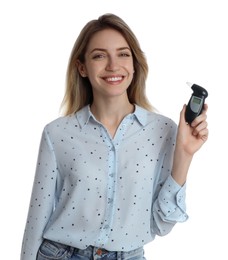 Young woman with modern breathalyzer on white background