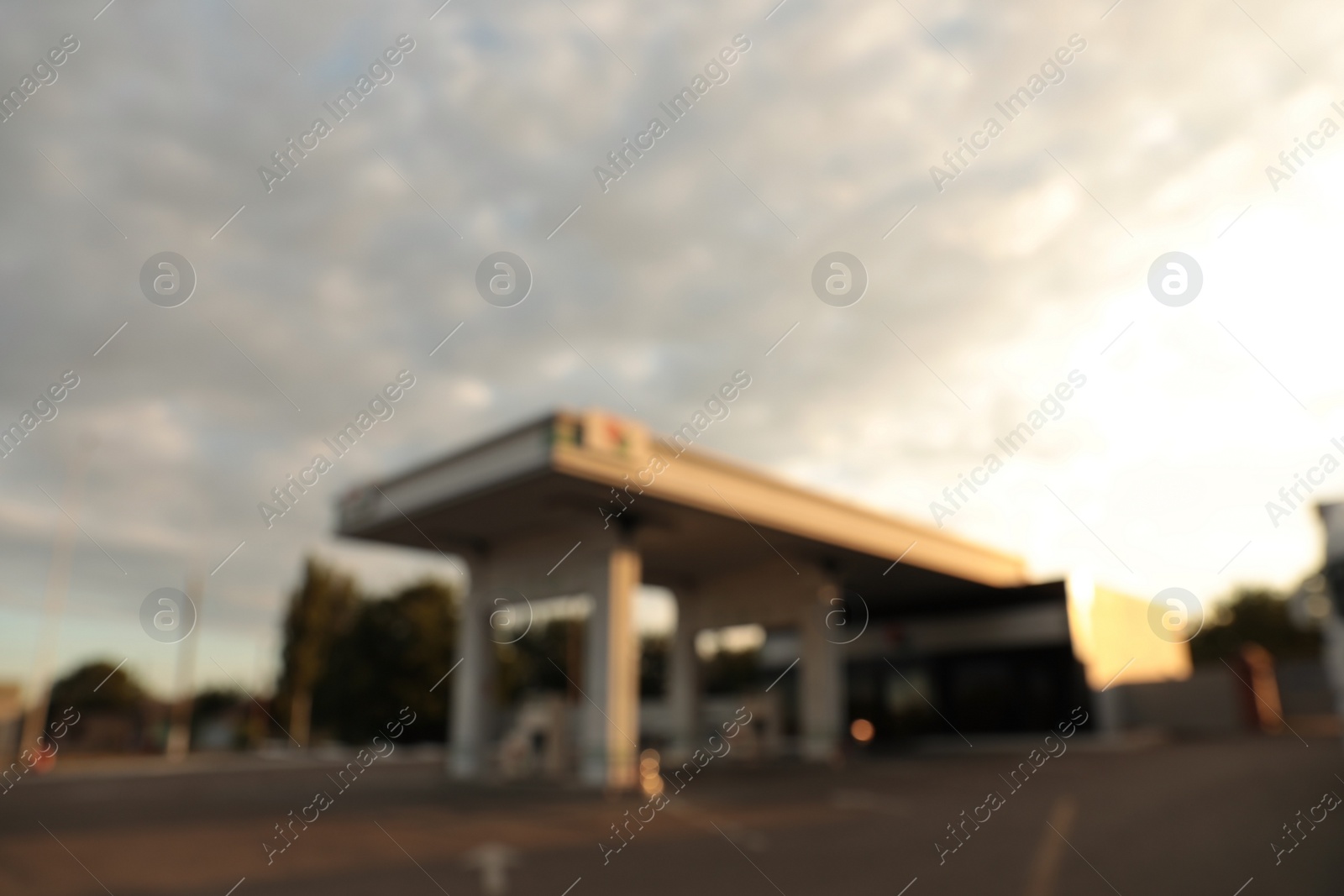 Photo of Blurred view of modern gas station outdoors