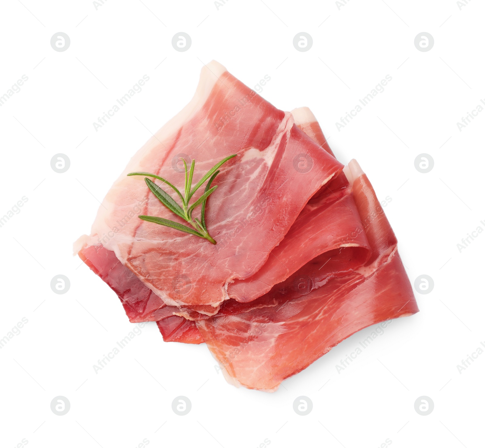 Photo of Slices of delicious jamon and rosemary isolated on white, top view