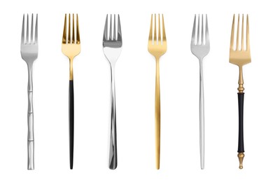 Stylish golden and silver forks isolated on white, set