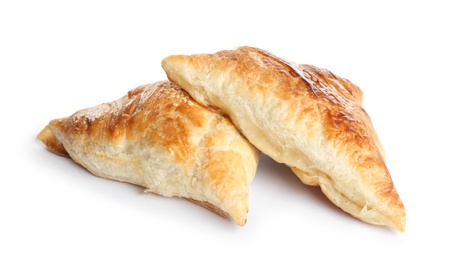 Photo of Fresh delicious puff pastry on white background