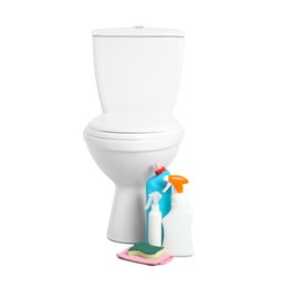 Different cleaning supplies near toilet bowl on white background