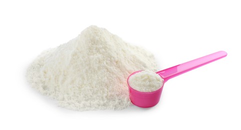 Photo of Powdered infant formula and scoop on white background. Baby milk