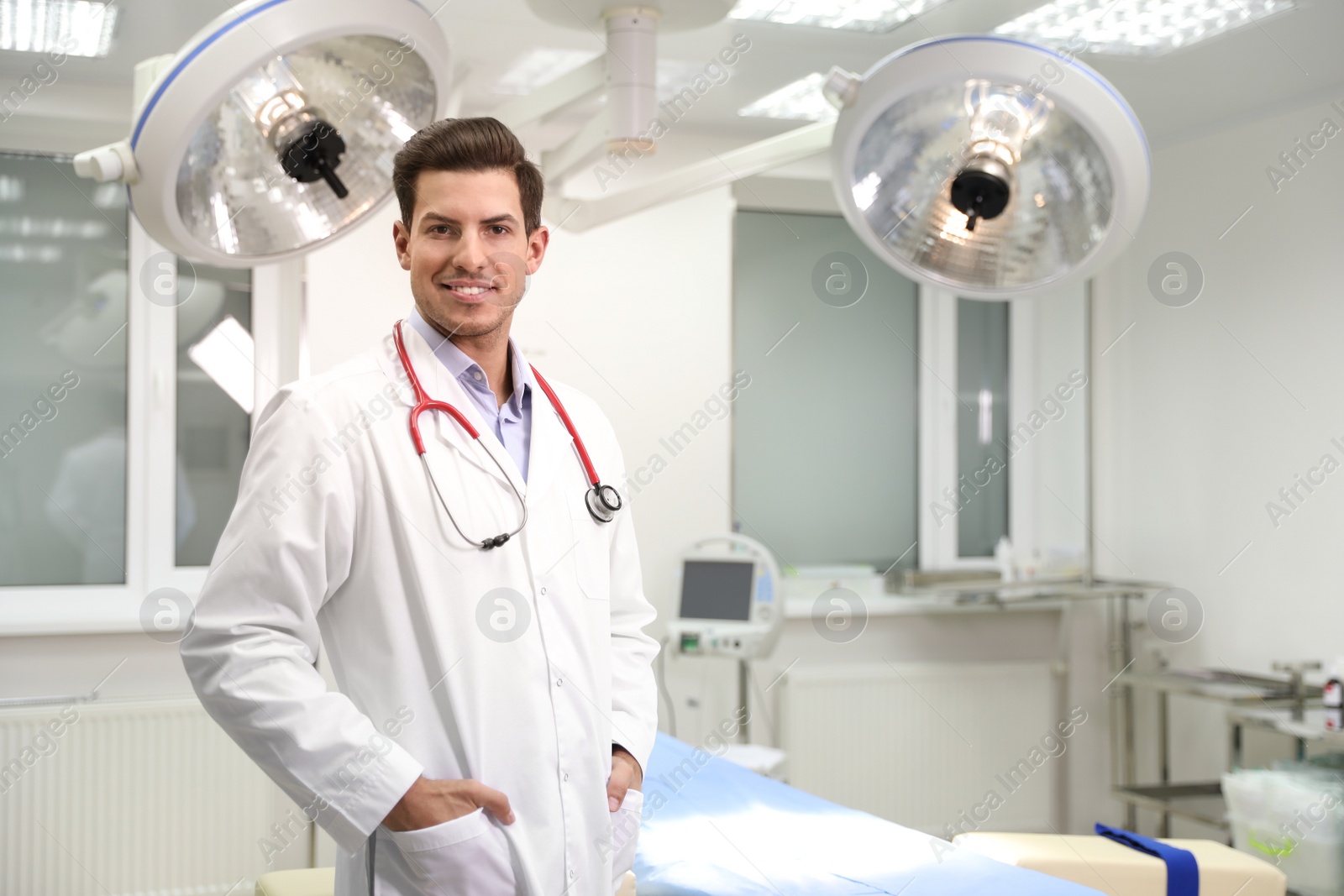 Photo of Portrait of professional doctor in modern surgery clinic. Space for text