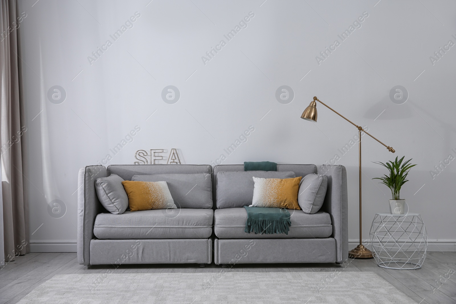 Photo of Modern living room interior with comfortable sofa