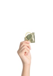 Woman holding condom on white background, closeup