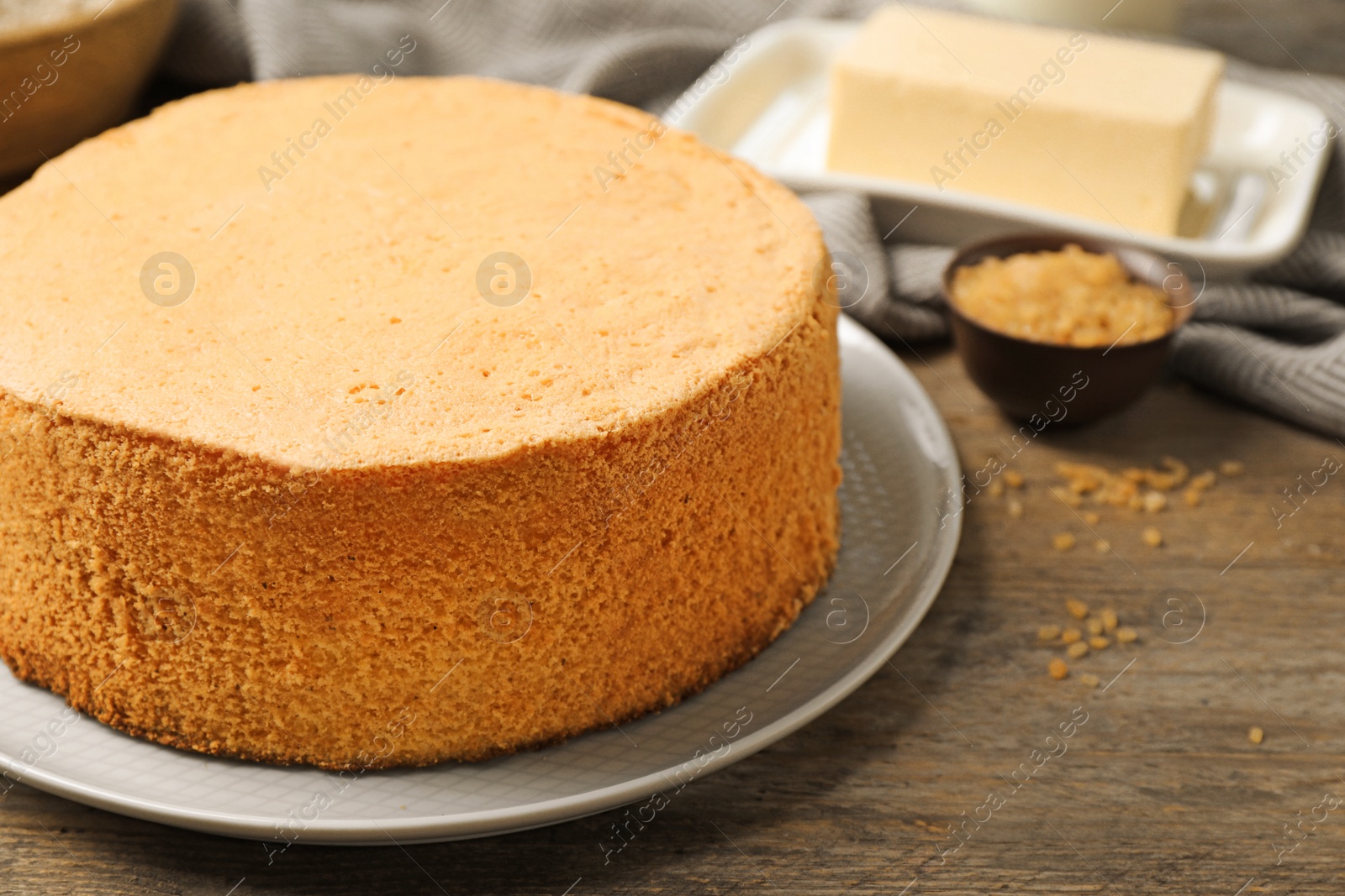 Photo of Delicious fresh homemade cake on wooden table