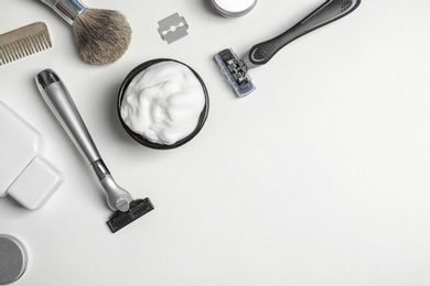 Photo of Flat lay composition with men's shaving accessories and space for text on white background