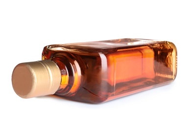 Photo of Bottle of scotch whiskey on white background