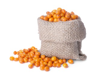 Sack with fresh ripe sea buckthorn berries on white background