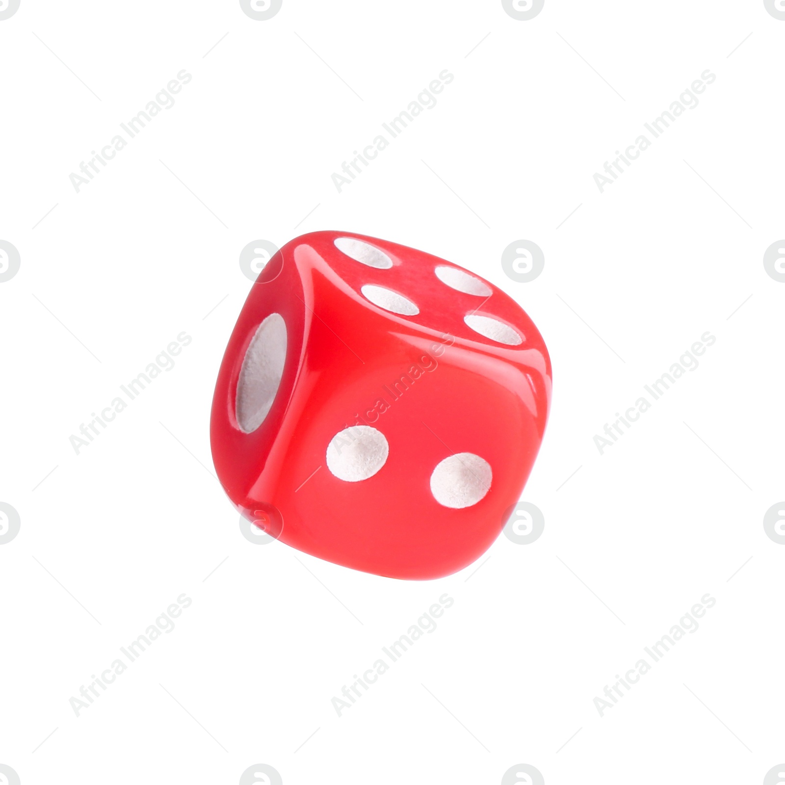 Photo of One red game dice isolated on white