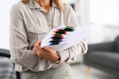 Photo of Businesswoman with documents in office, closeup view