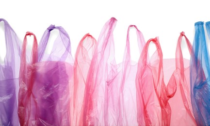 Many different plastic bags on white background