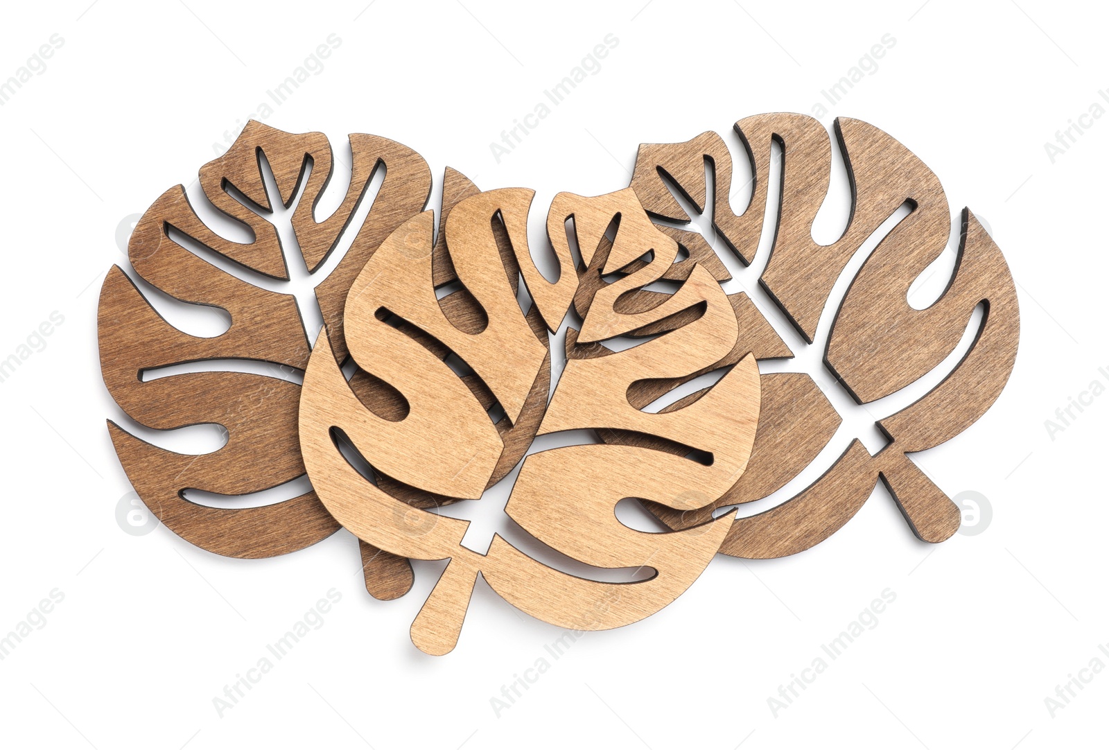 Photo of Leaf shaped wooden cup coasters on white background, top view