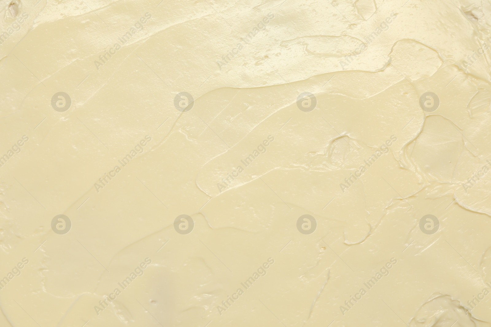 Photo of Texture of fresh natural butter as background, top view