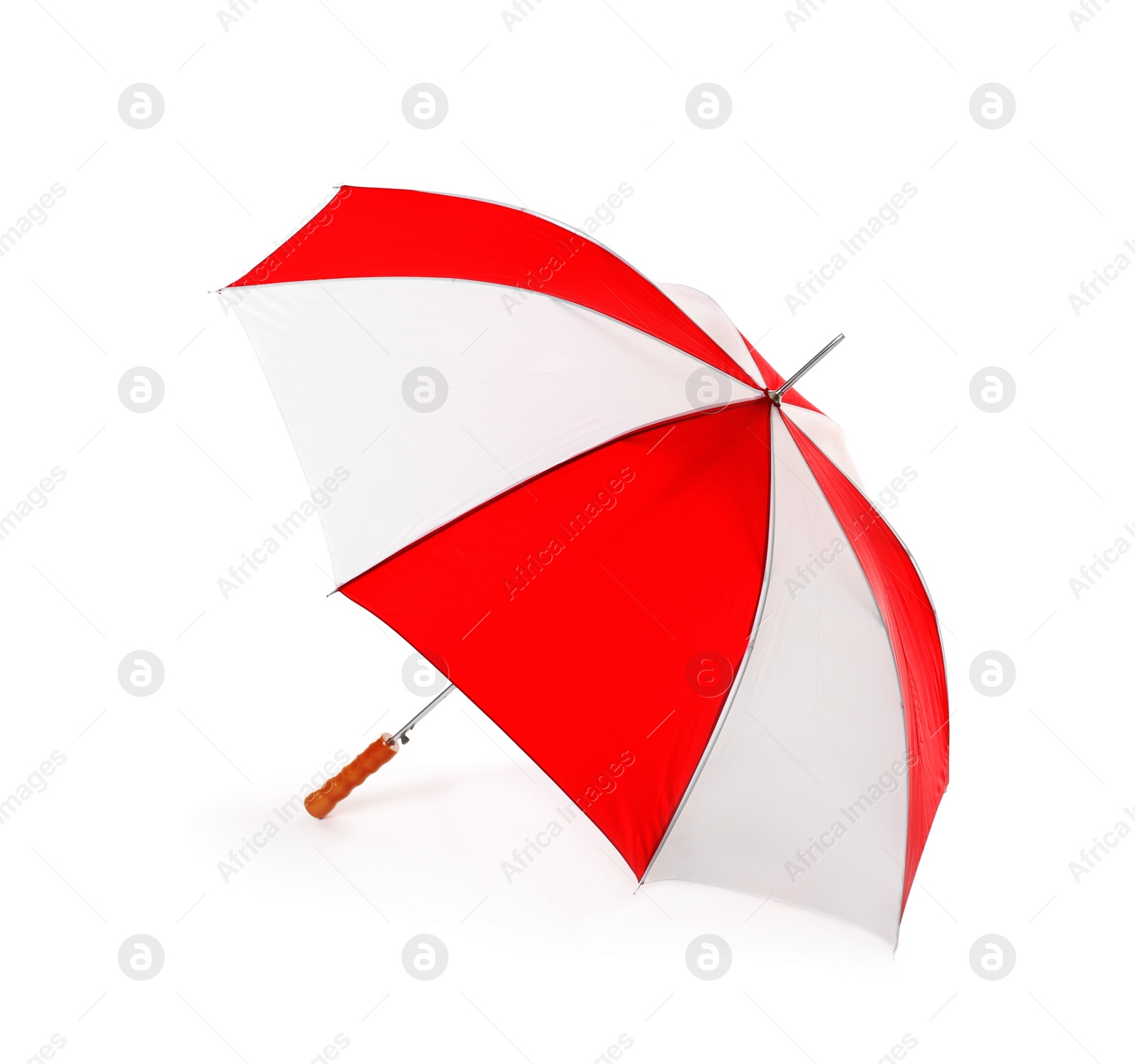 Photo of Modern opened bright umbrella isolated on white