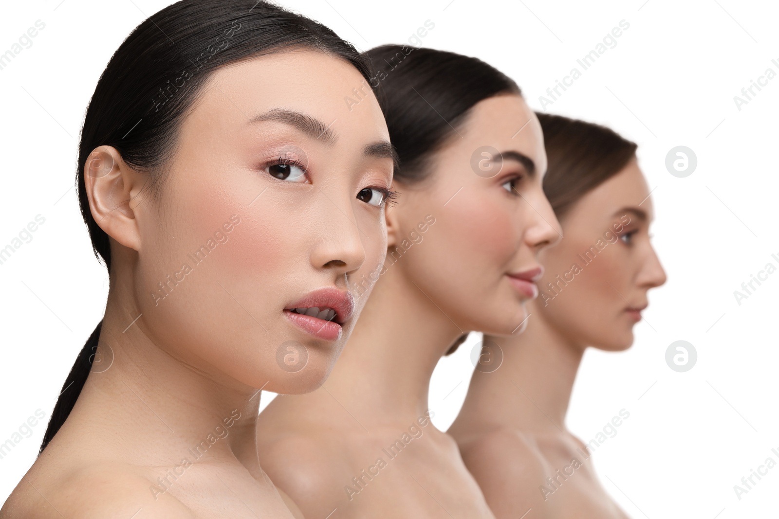 Photo of Beautiful young women with healthy skin on white background