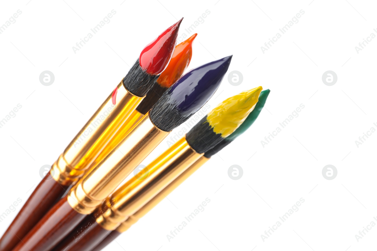 Photo of Brushes with colorful paints on white background