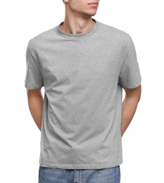 Young man wearing grey t-shirt on white background, closeup