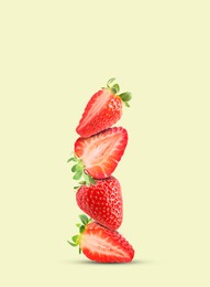 Image of Stack of fresh strawberries on beige background