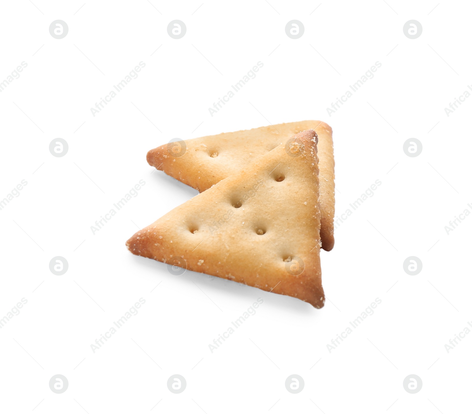 Photo of Crispy crackers isolated on white. Delicious snack