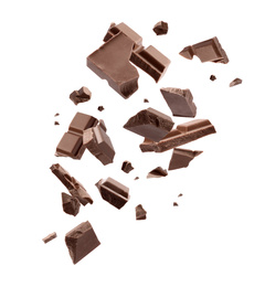 Image of Milk chocolate pieces falling on white background