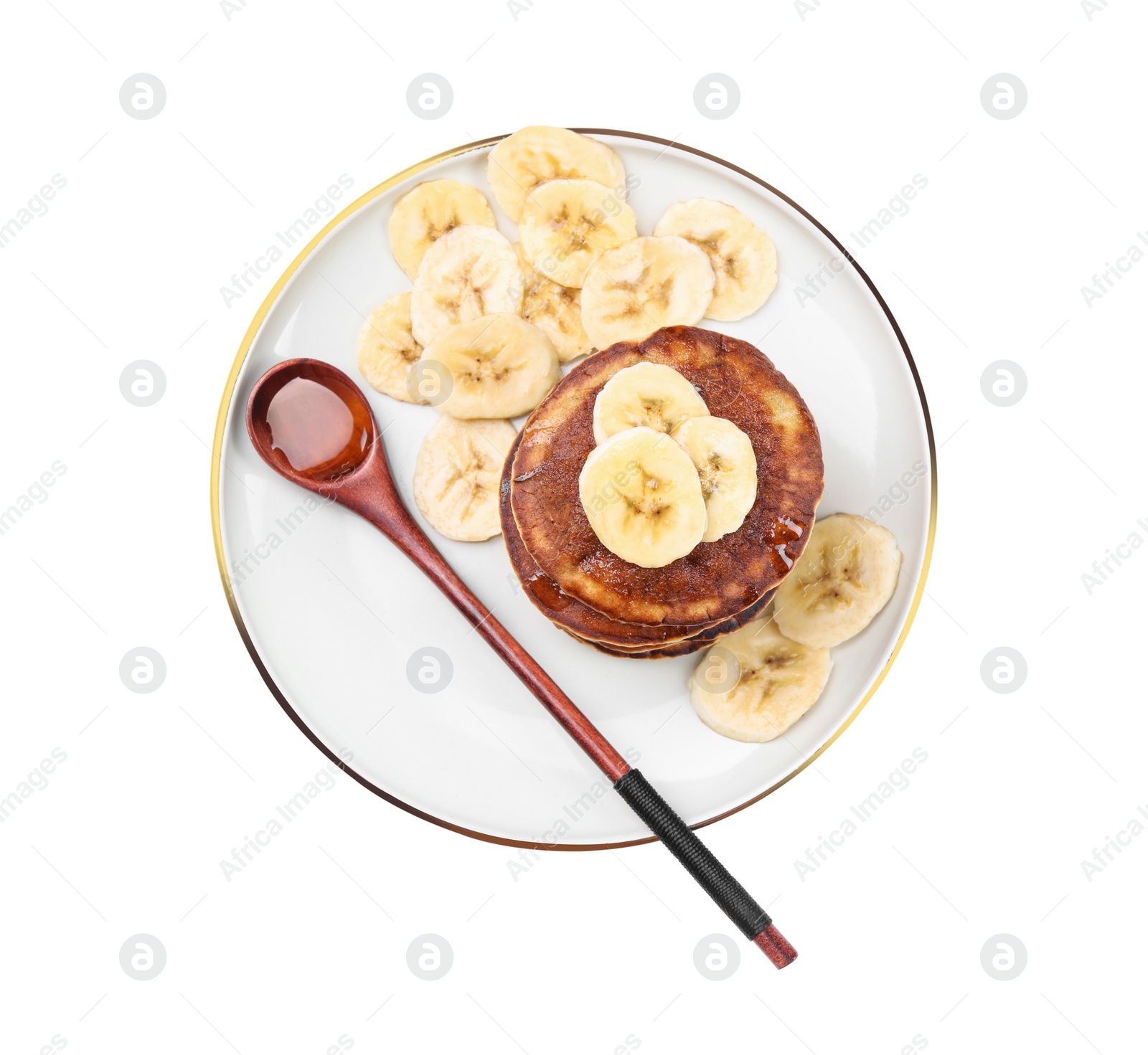 Photo of Plate of banana pancakes with honey isolated on white, top view