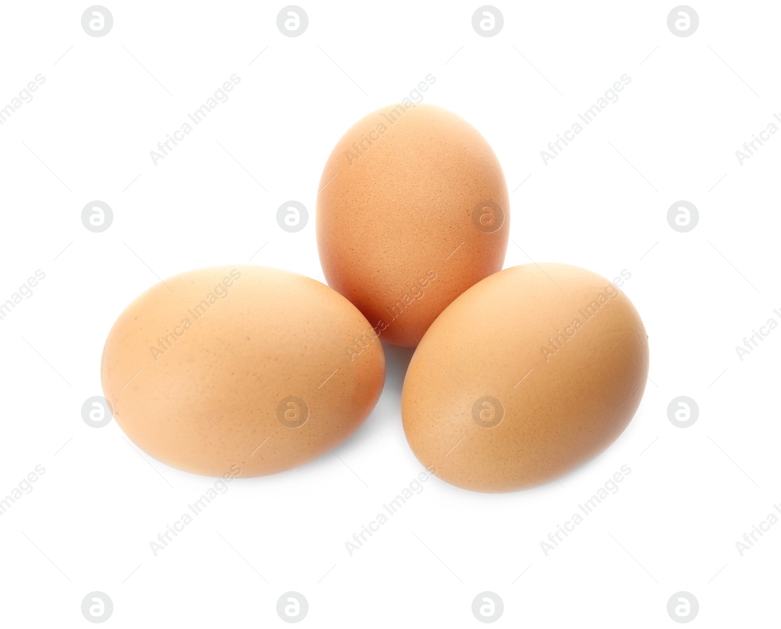 Photo of Few raw chicken eggs on white background