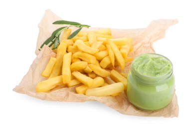 Parchment with french fries, avocado dip and rosemary isolated on white
