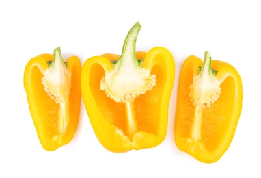 Photo of Cut yellow bell pepper isolated on white, top view