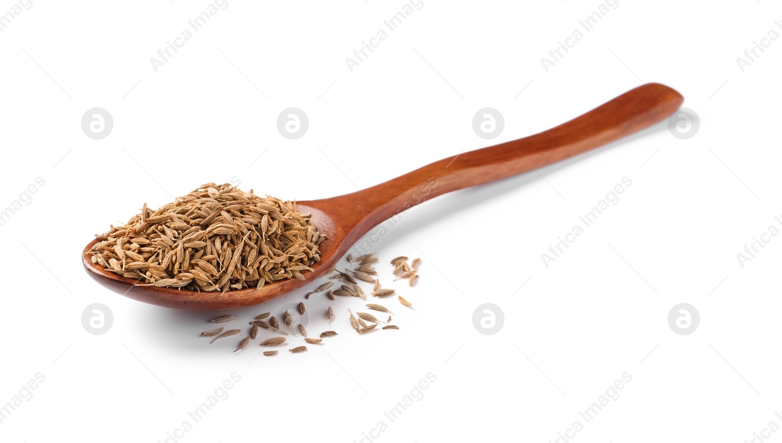 Photo of Spoon of aromatic caraway (Persian cumin) seeds isolated on white