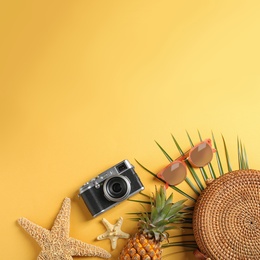 Photo of Flat lay composition with beach accessories on color background. Space for text