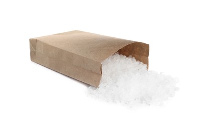 Natural salt and paper bag on white background