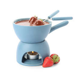 Fondue pot with chocolate and fresh strawberries isolated on white