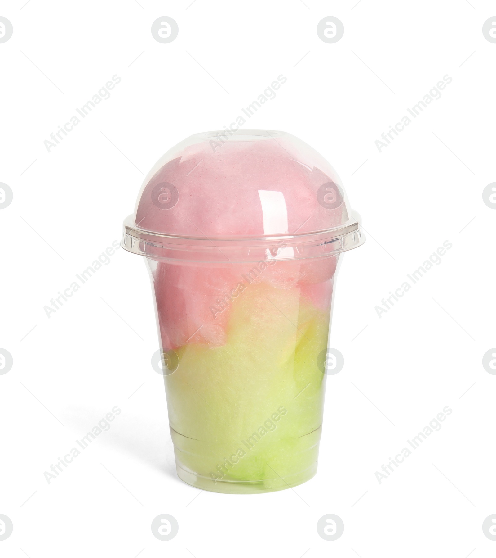 Photo of Plastic cup with tasty cotton candy on white background