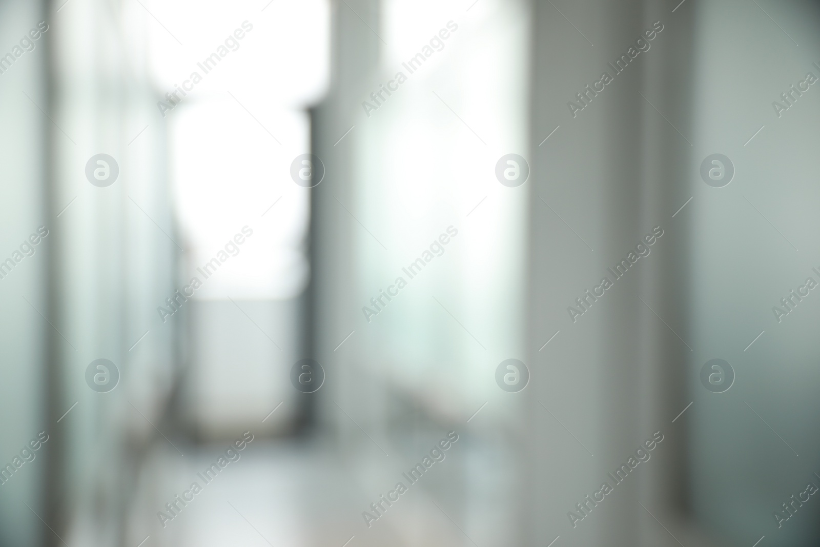 Photo of Blurred view of empty corridor in company