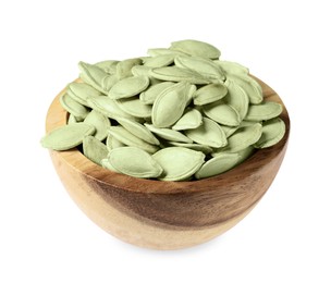 Wooden bowl with pumpkin seeds isolated on white