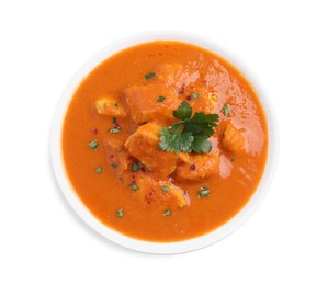 Photo of Bowl of delicious chicken curry on white background, top view