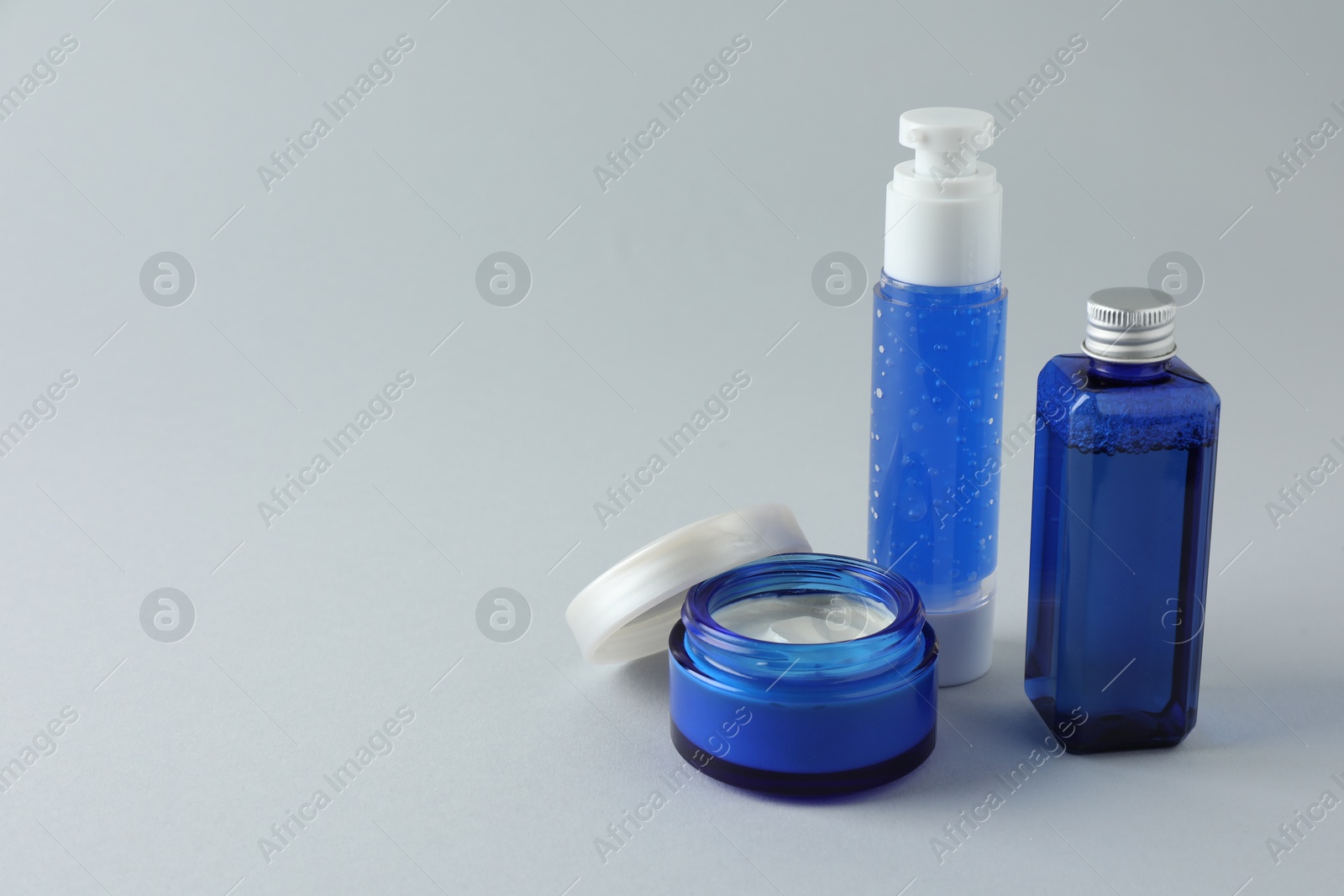 Photo of Set of luxury cosmetic products on white background. Space for text