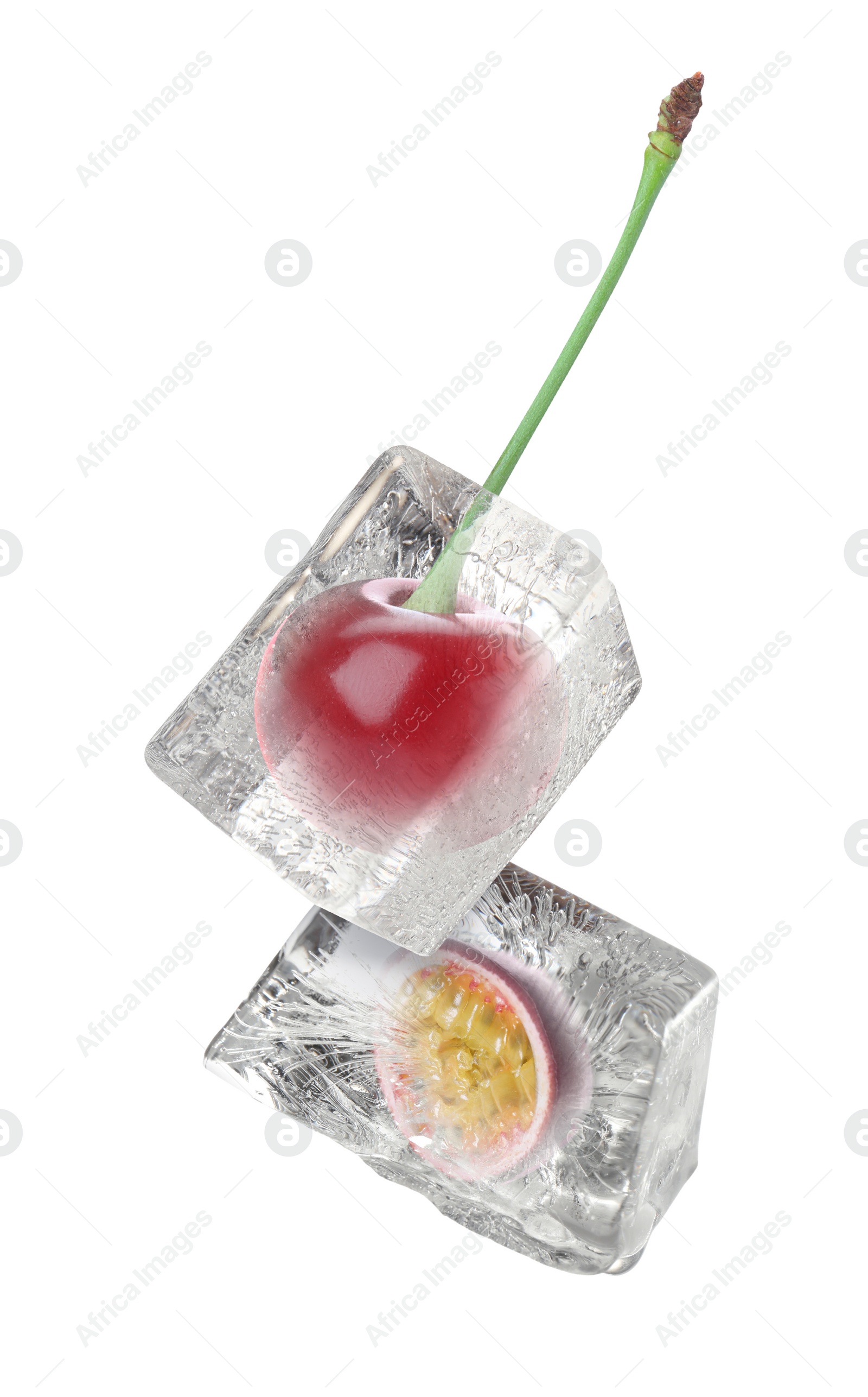 Image of Cherry and passion fruit frozen in ice cubes on white background