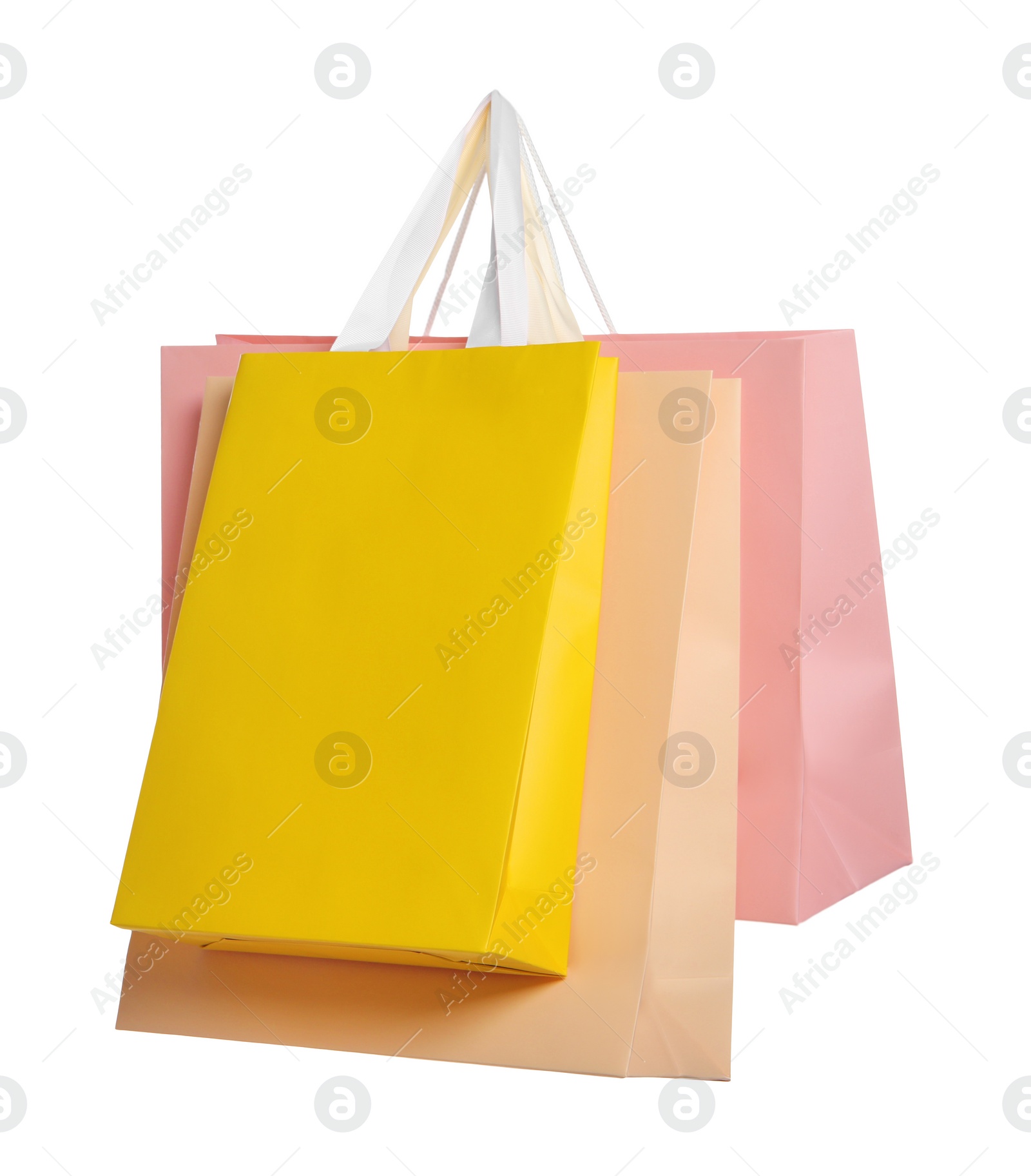 Photo of Colorful paper shopping bags isolated on white